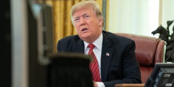 President Donald J. Trump participates in a Christmas Day video teleconference from the Oval Office